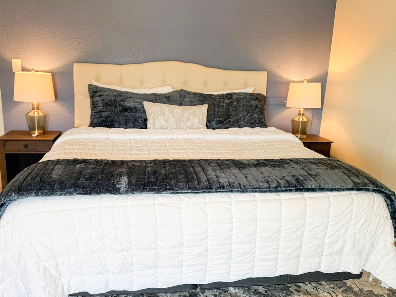 Sink into a plush king-size bed with hotel-style linens, designed for ultimate rest and relaxation.