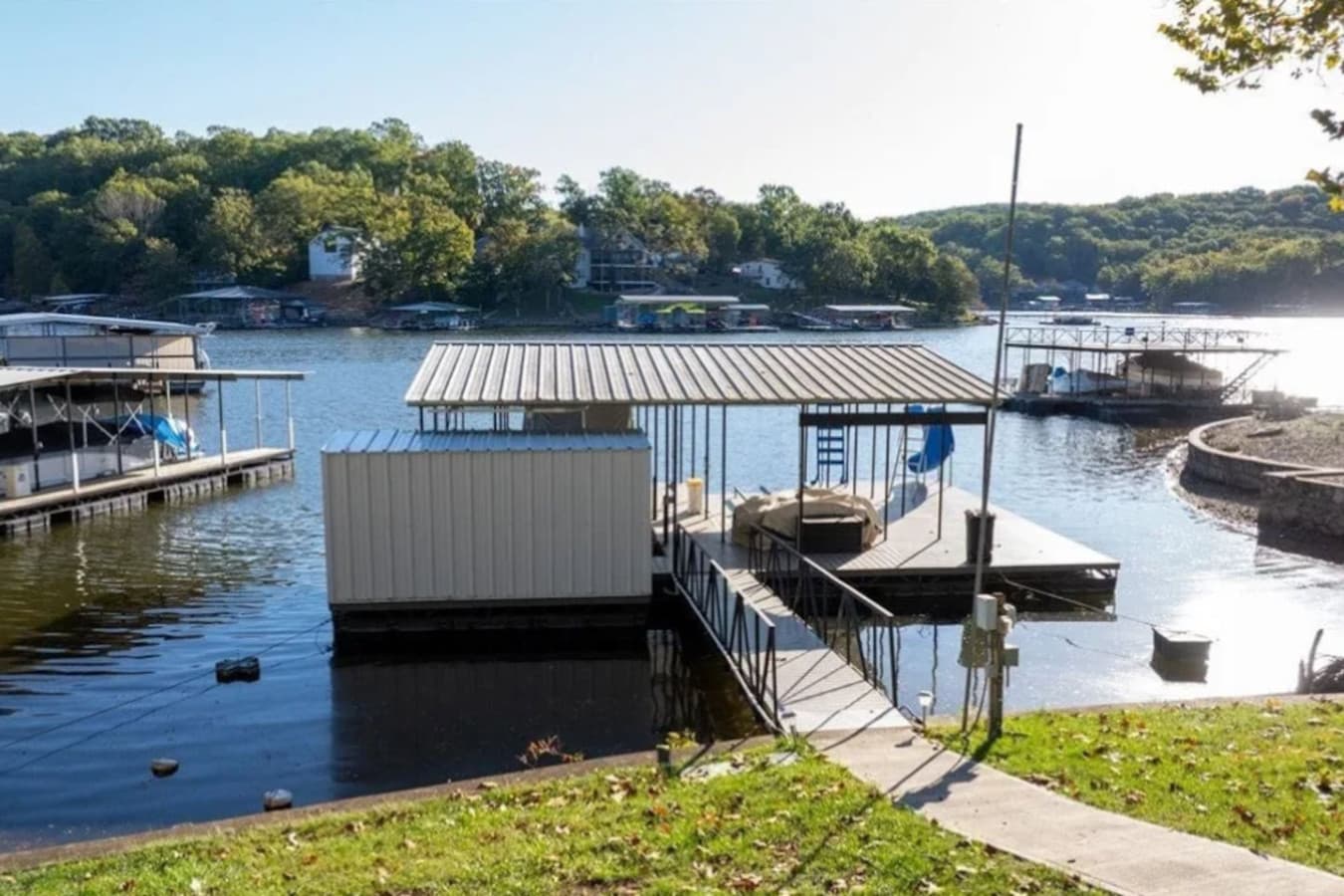 Relax at this lakefront getaway with a private dock, perfect for boating, fishing, and soaking in peaceful water views. Ideal for lake vacations and weekend escapes.