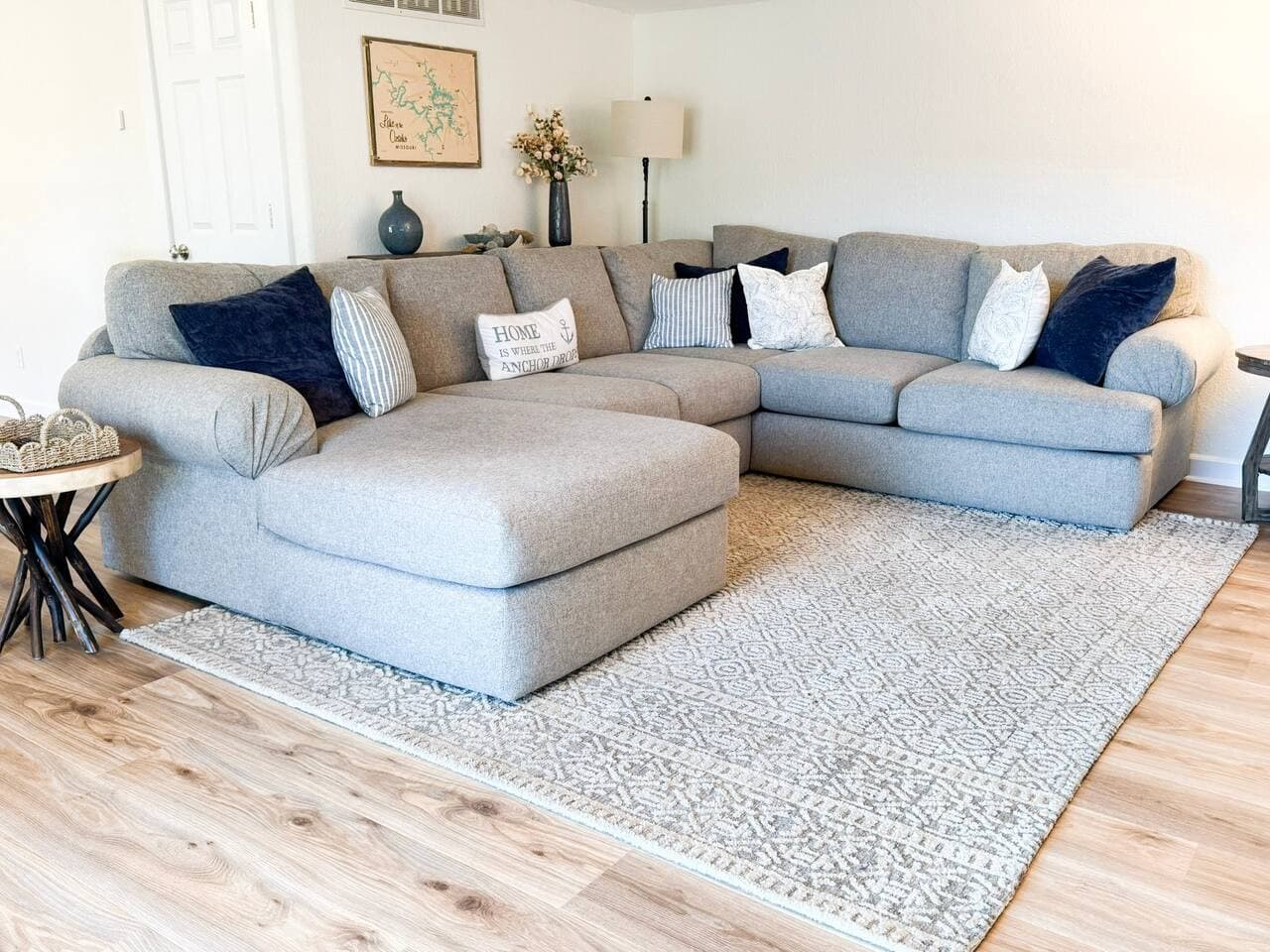 Stretch out and relax in the spacious living room with a plush sectional, perfect for movie nights and gathering together.