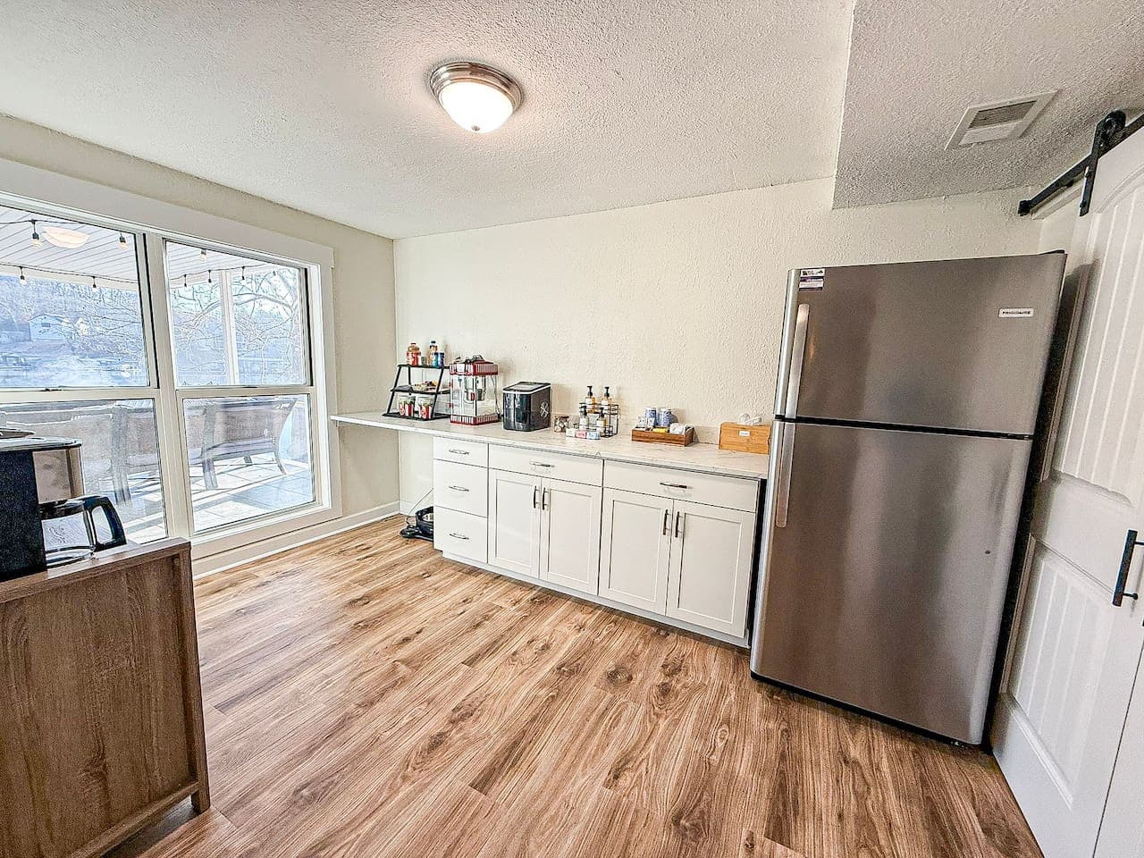 Start your day in this bright, fully equipped kitchenette, perfect for easy meals and morning coffee before lake adventures.