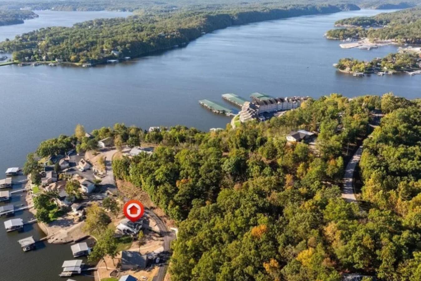 Escape to a serene lake-view retreat nestled in the trees, offering privacy with easy access to marinas and waterfront fun.