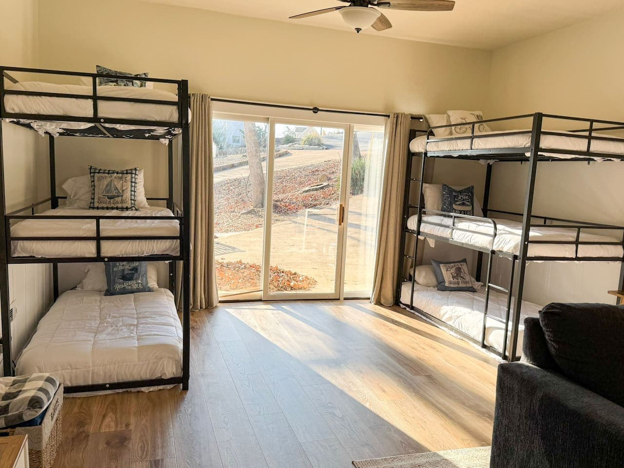 Sleep, relax, and recharge in this bright bunk room with full-over-full beds, perfect for kids or extra guests.