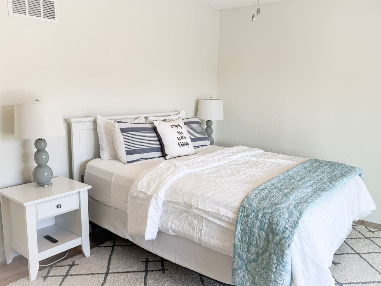 Sleep soundly in this cozy queen bed retreat, designed for comfort after a full day of lake adventures.
