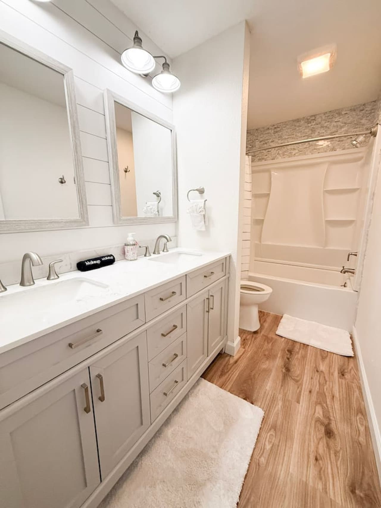 Refresh in this bright, modern bathroom with a double vanity and full tub/shower, designed for comfort and convenience.