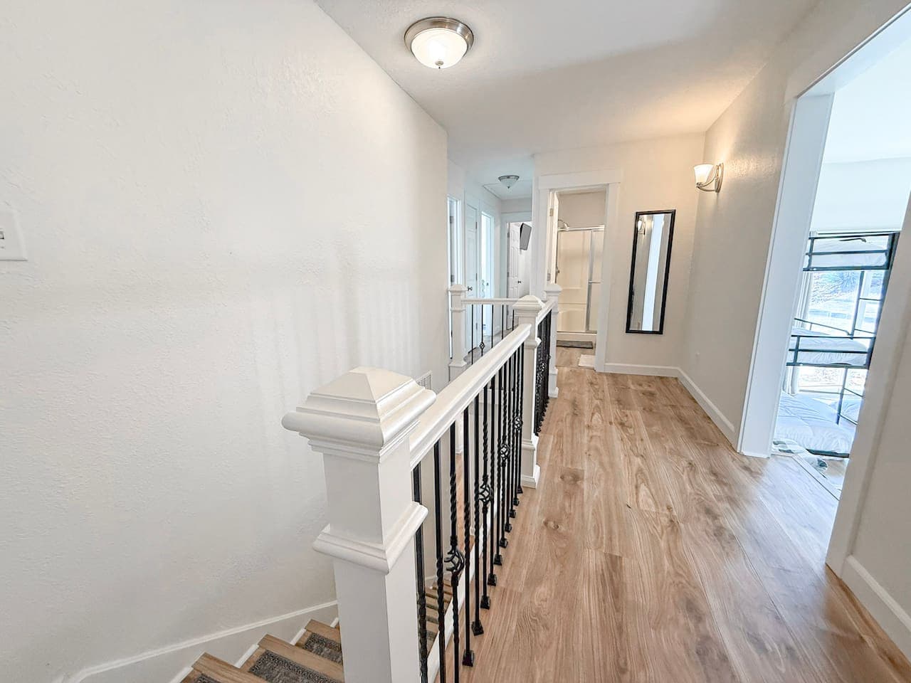 Enjoy a bright, open hallway with modern finishes and easy flow throughout the home.
Designed for comfort and convenience, this spacious layout makes your lakefront getaway feel welcoming and effortless.
