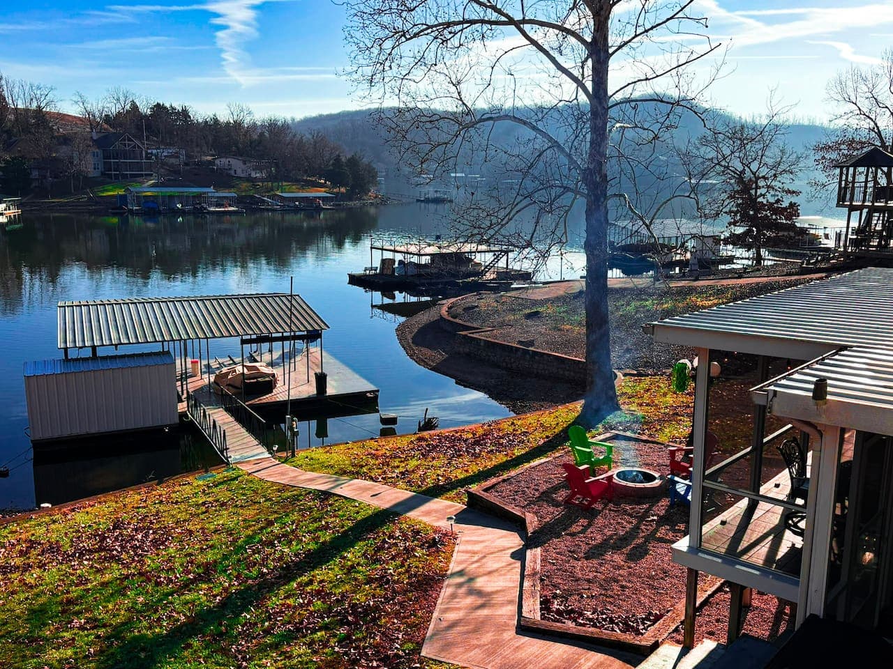 Soak in breathtaking lake views from this scenic waterfront retreat, featuring private dock access and peaceful outdoor spaces.