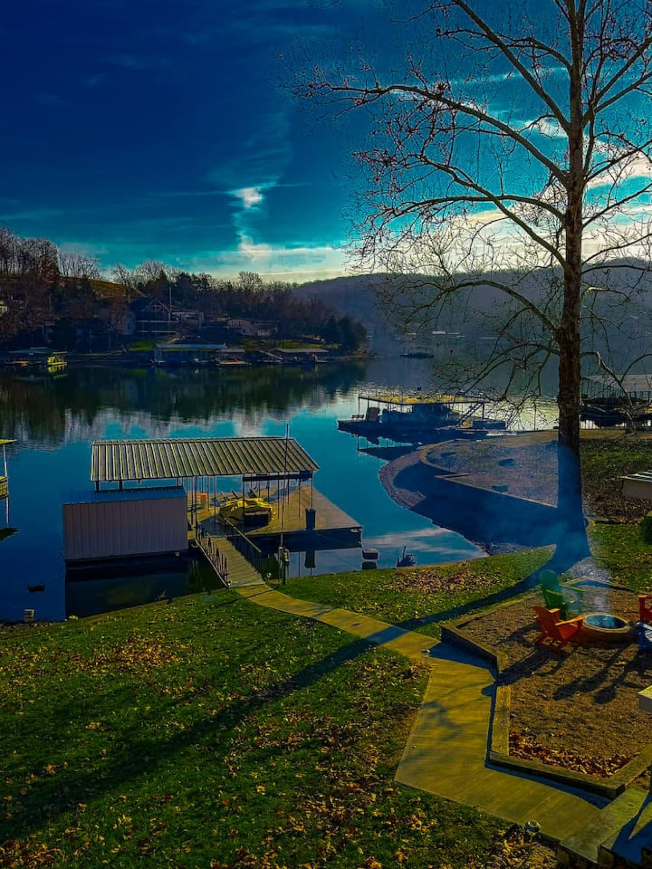 Soak in breathtaking lakefront views with private dock access, surrounded by peaceful nature and open water.