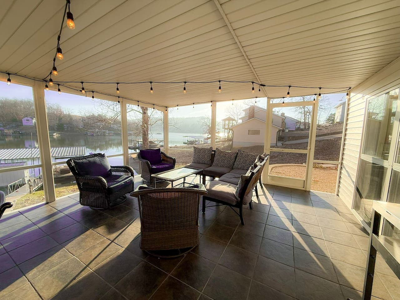 Relax on the spacious covered lakefront patio, perfect for morning coffee, sunset views, and evening gatherings.
