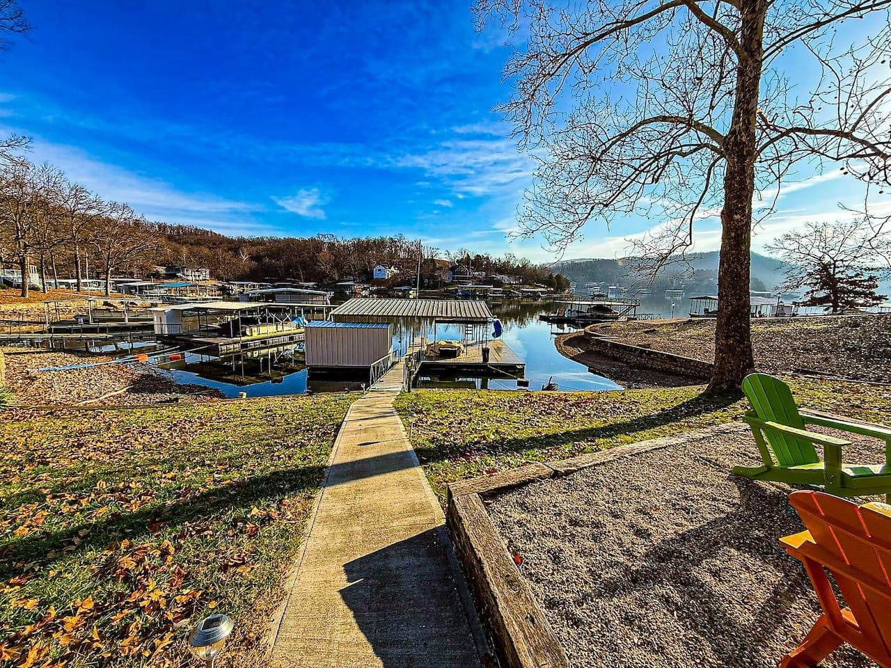 Step into a beautiful lakefront retreat with a private dock and scenic shoreline views, just steps from the water.