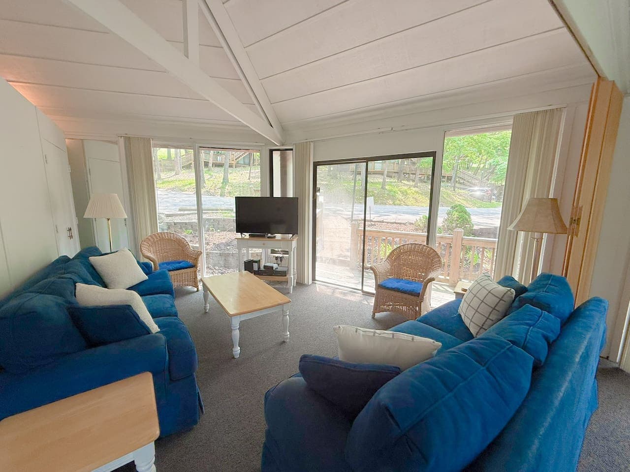Relax and enjoy the cozy living space, featuring comfortable seating and an entertainment area for your enjoyment after a day on the lake.