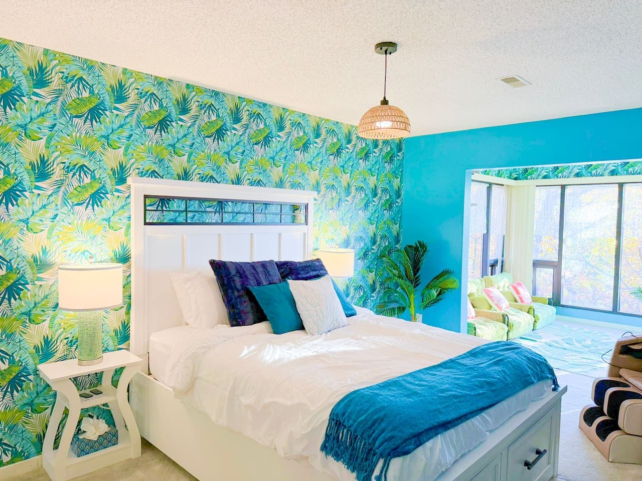 Island vibes and tranquil nights in the master bedroom with a queen bed and luxury linens.