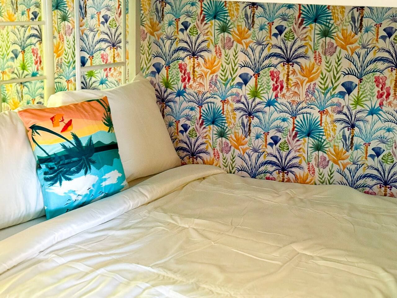 Vibrant, tropical-themed bedroom.