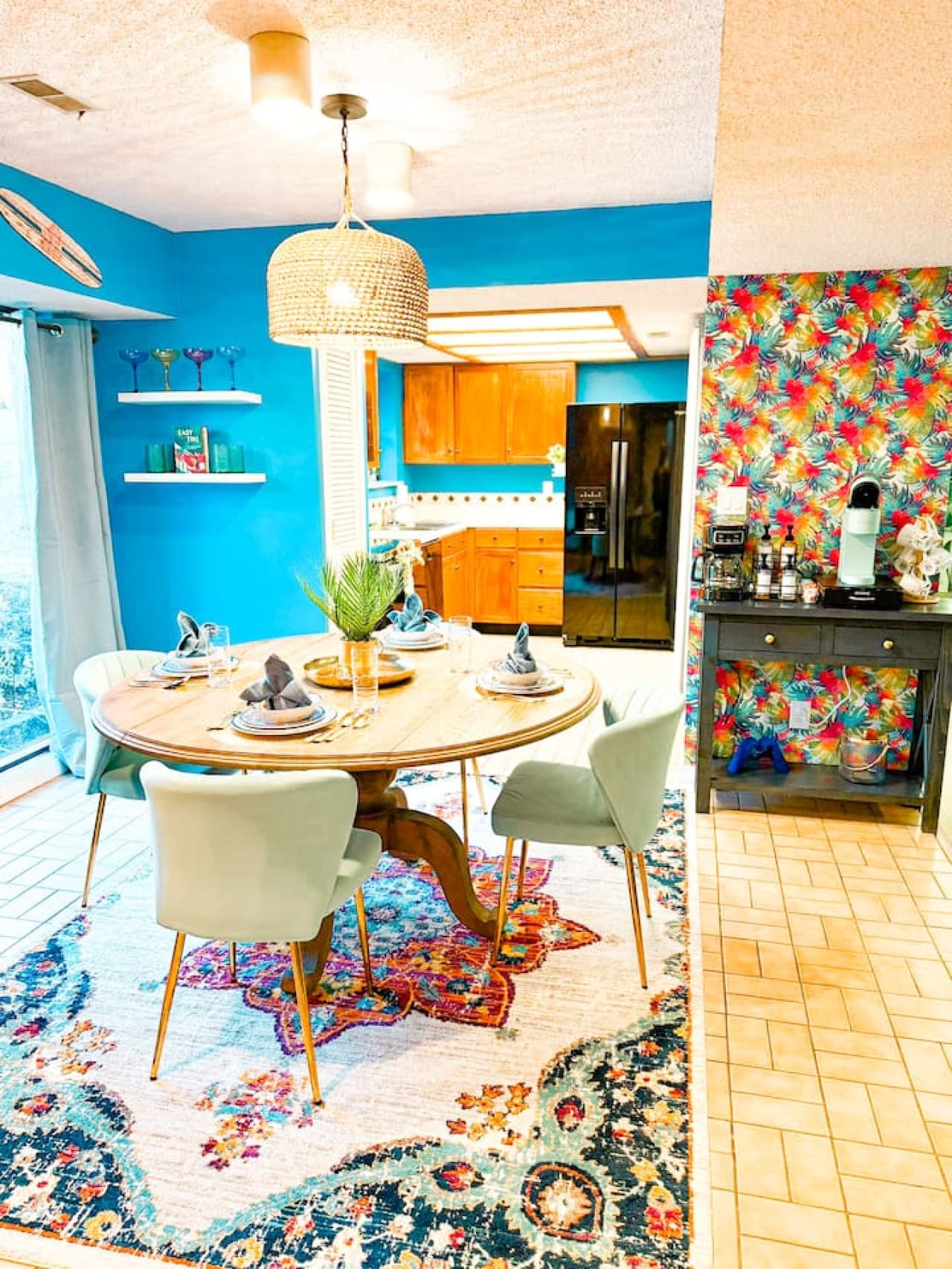 Bright dining area flowing into a modern kitchen.
