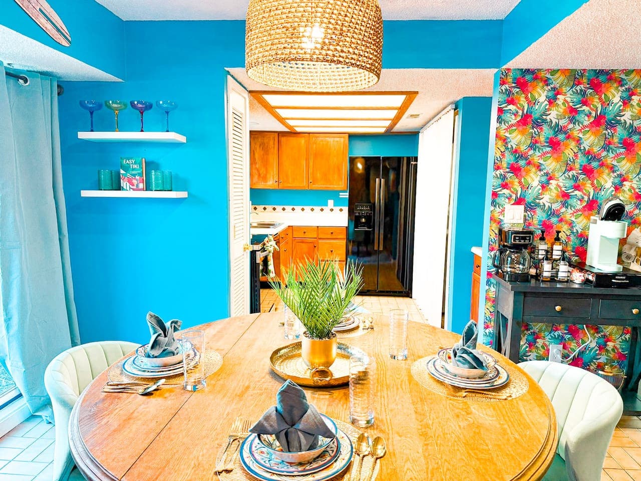 Beautifully set dining table with warm, colorful accents.