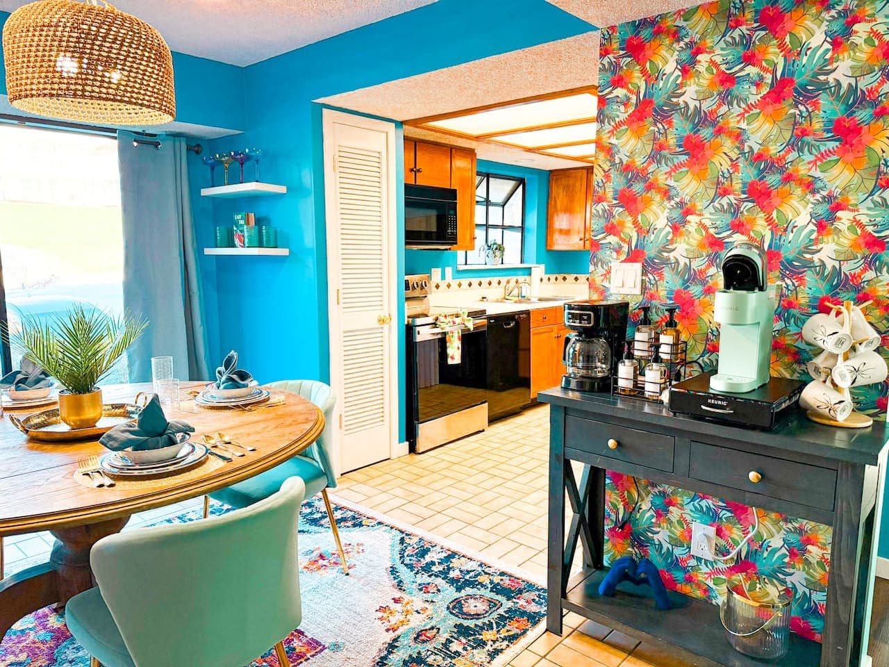 Vibrant dining area with a full coffee station and kitchen view.