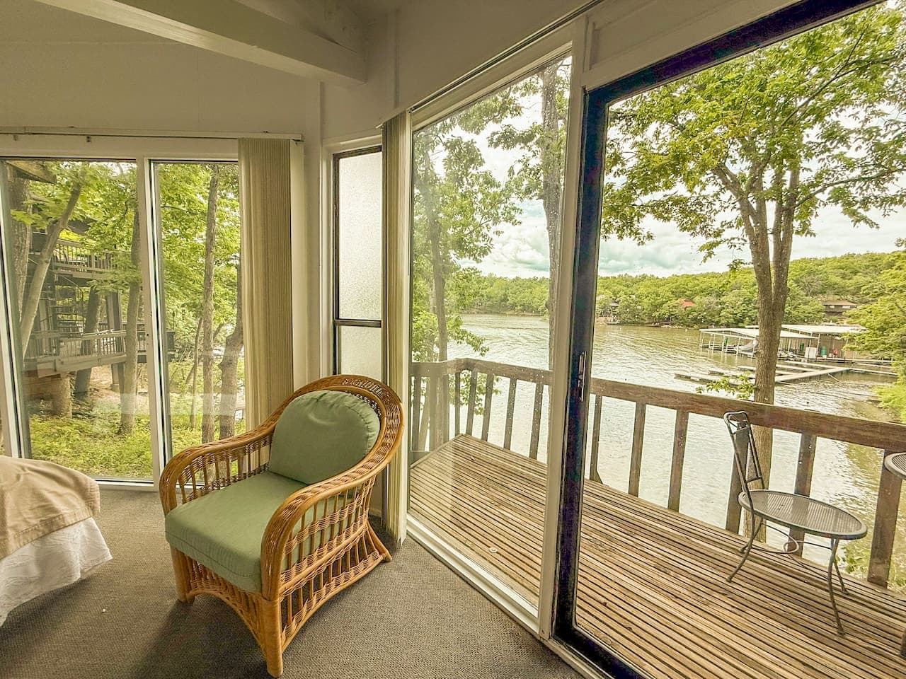 Start your day with peaceful lake views from the comfort of this cozy bedroom