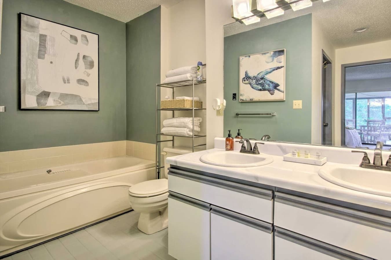 Both bathrooms feature full-sized showers and come stocked with starter sets of towels and toiletries.
