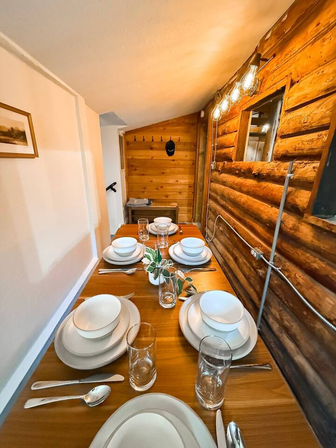 Cozy dining space with rustic wood charm.
