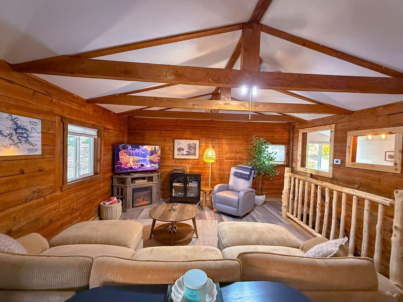 Fireplace, TV, and plenty of seating.
