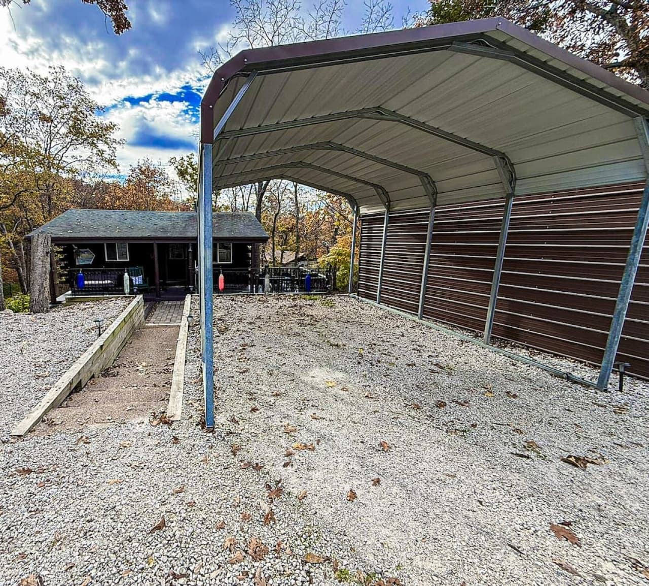 Covered carport and easy entry walkway.
