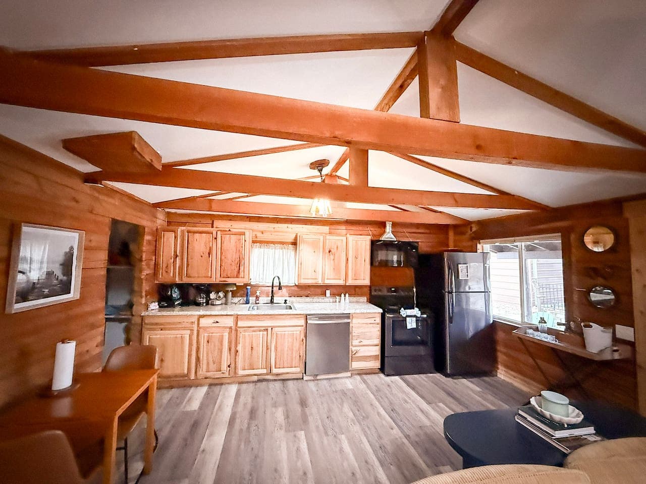 Fully equipped kitchen with modern appliances.