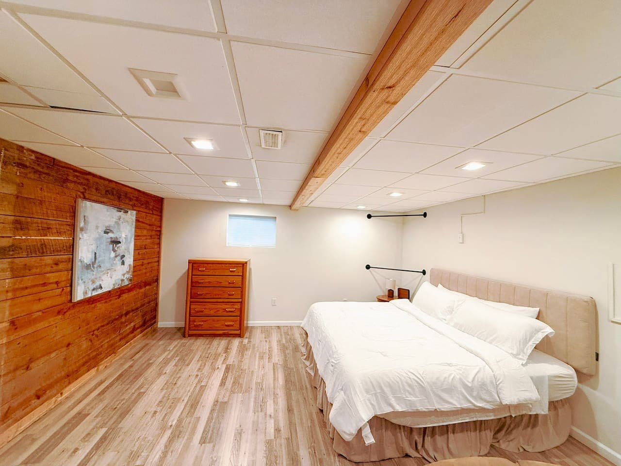 King bed and natural wood accents.