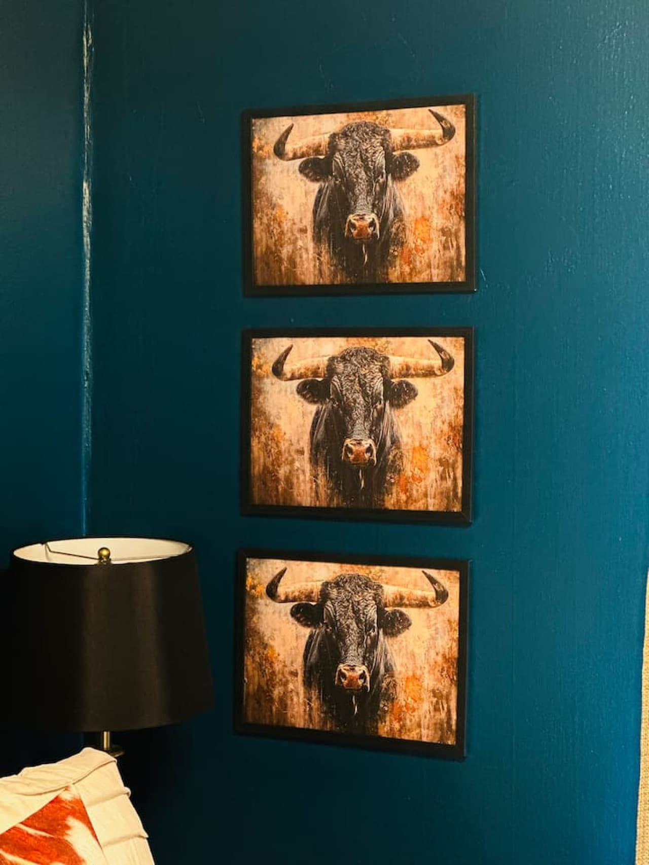 Three times the charm! We love this powerful trio of bull artwork adding a bold touch to our bungalow.