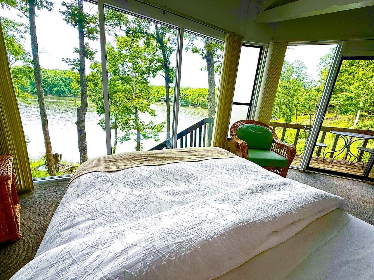 Sunlight filters through the trees and into your bedroom—nature is just outside your window at Branch Bungalow.