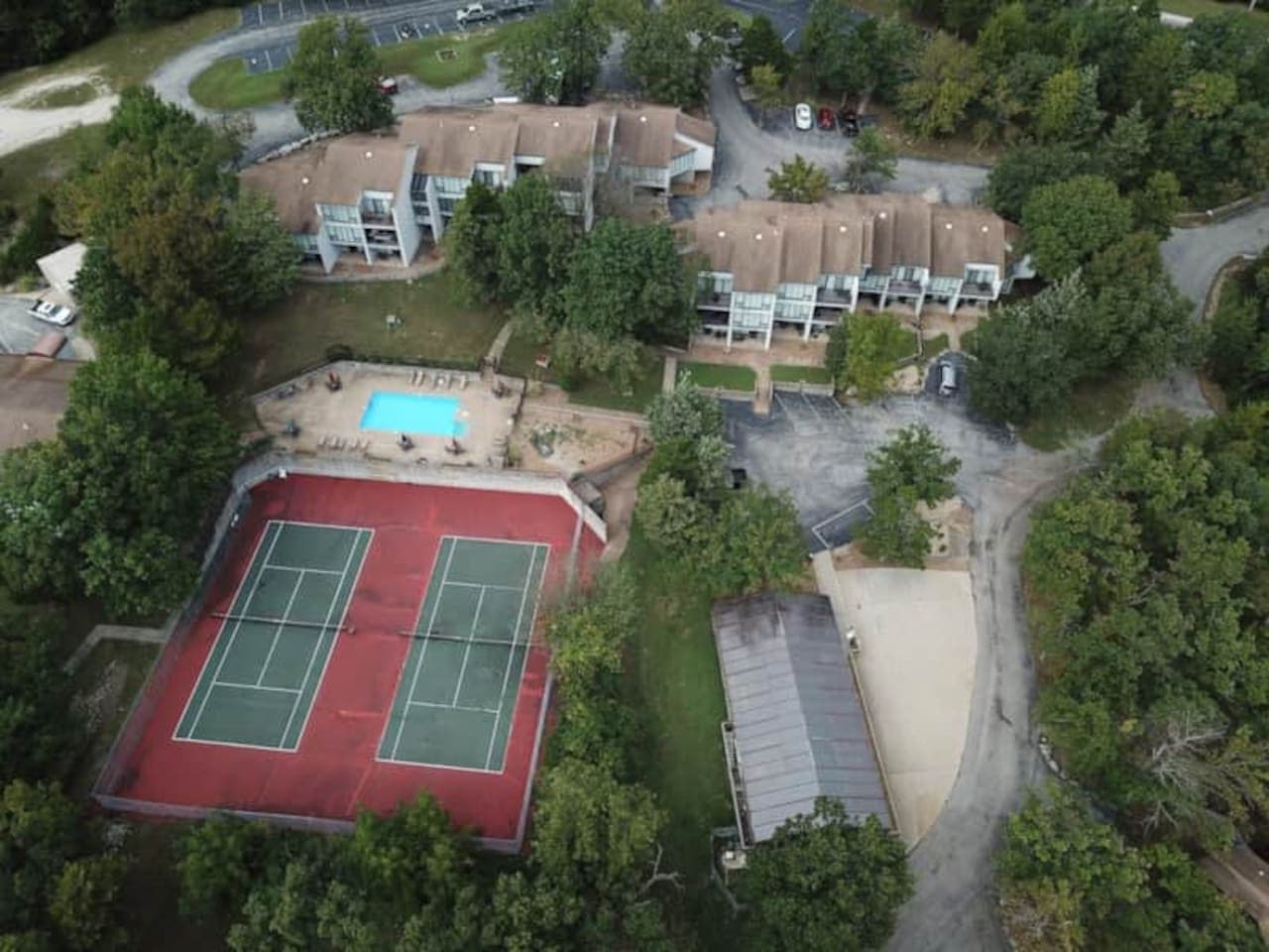 Experience the unique charm of Treetop Village, nestled amidst the lush landscapes of Lake of the Ozarks.