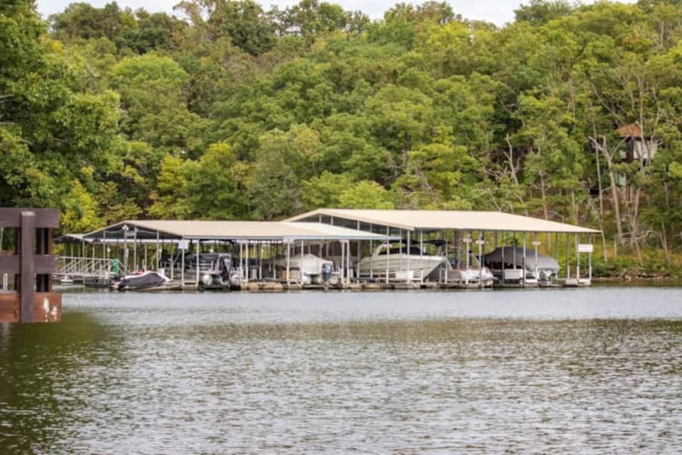 This tranquil lakefront home boasts a private boat dock, providing immediate access for all your water adventures. Enjoy the serenity of the lake from your doorstep, with a perfect view of the surrounding natural beauty.