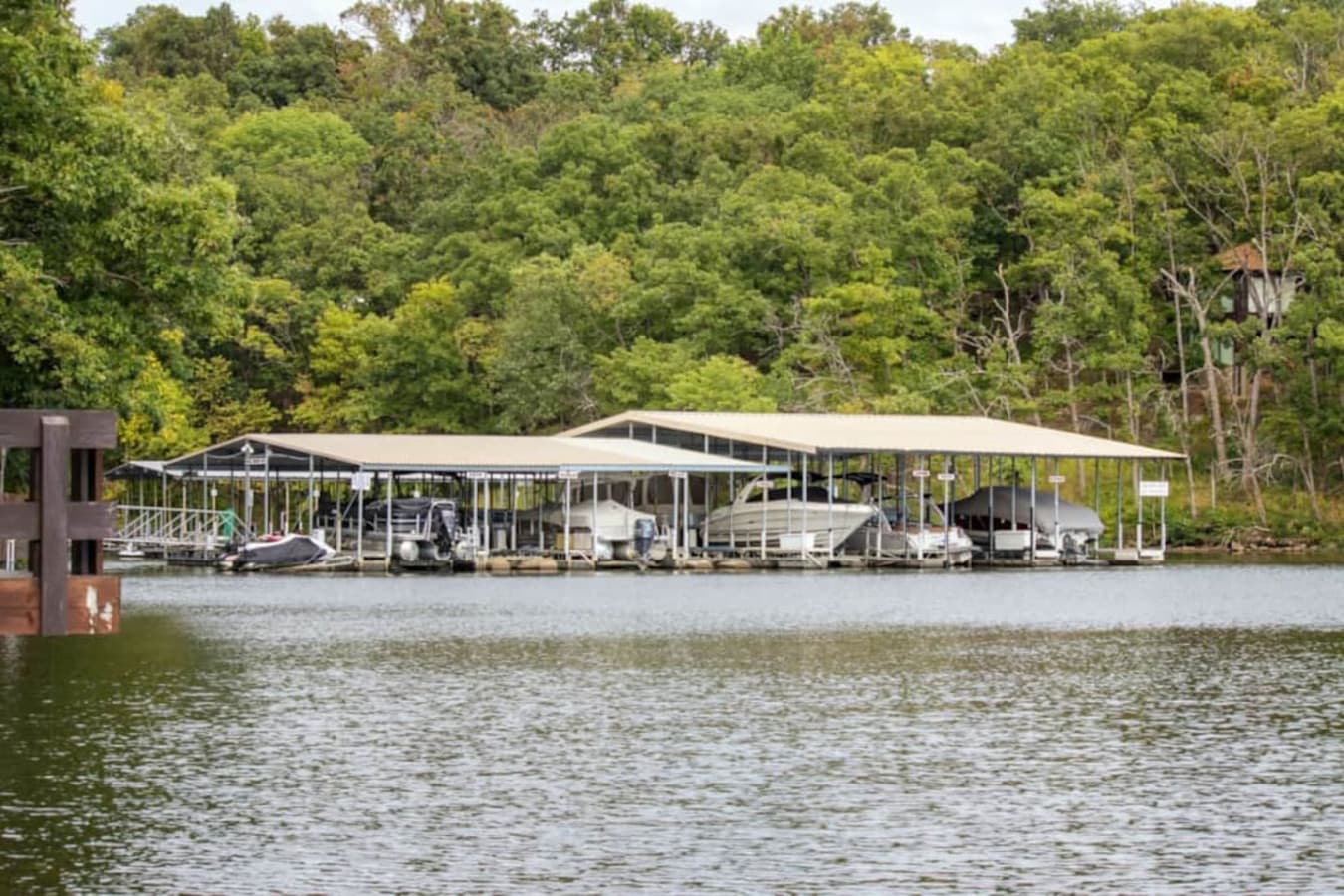 This tranquil lakefront home boasts a private boat dock, providing immediate access for all your water adventures. Enjoy the serenity of the lake from your doorstep, with a perfect view of the surrounding natural beauty.