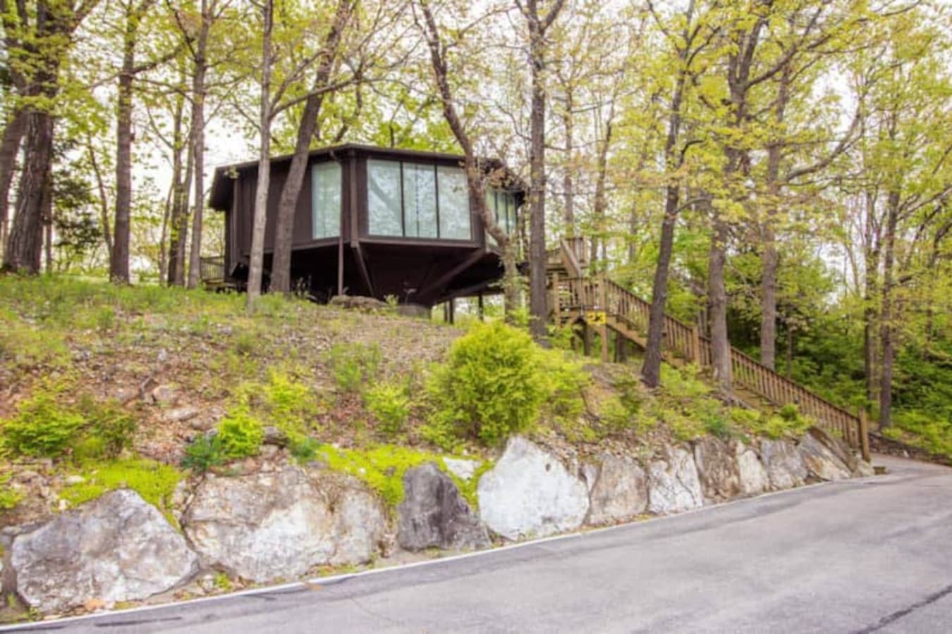 Discover the unique "treetop" style of Unit 23 at Treetop Village, blending harmoniously with its natural, wooded surroundings.