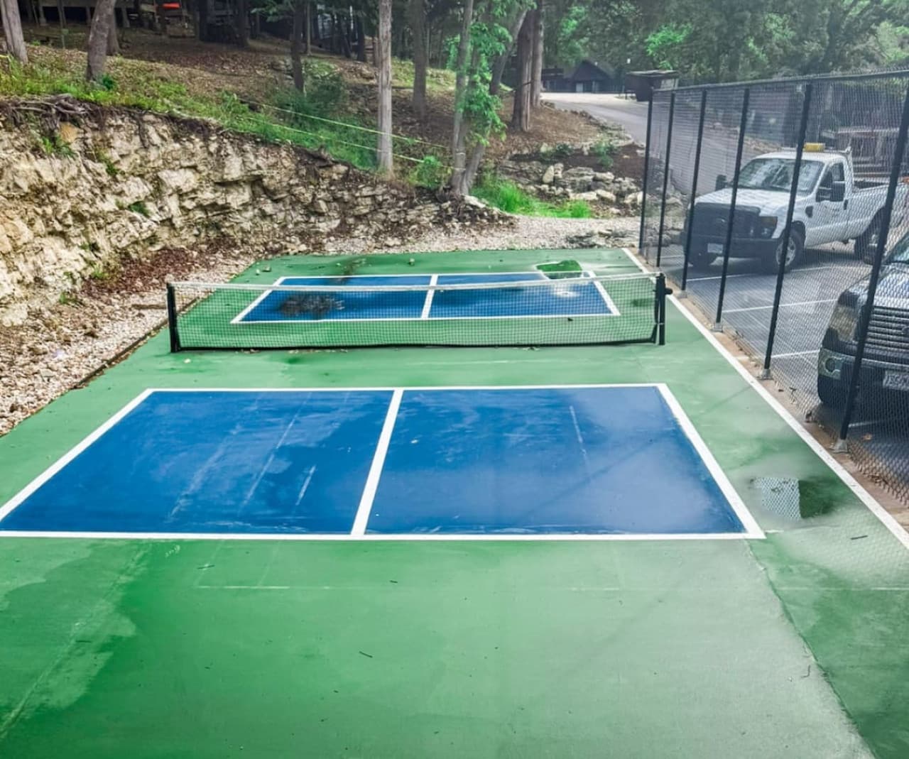 Pickleball court located across from the pool – paddles available to check out at the Treetop office during business hours