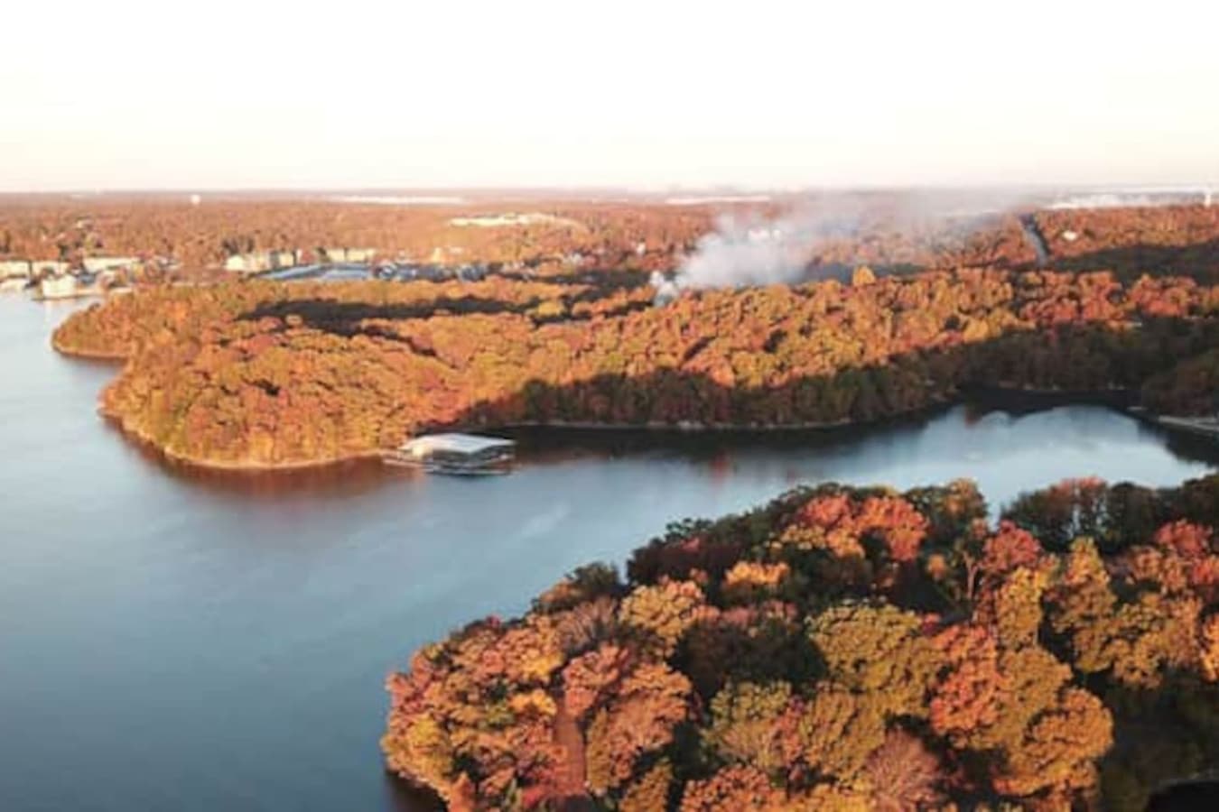 This stunning lakefront rental offers direct water access, perfect for boating and enjoying scenic views. Surrounded by lush greenery, it's an ideal retreat for those seeking tranquility and outdoor adventures.