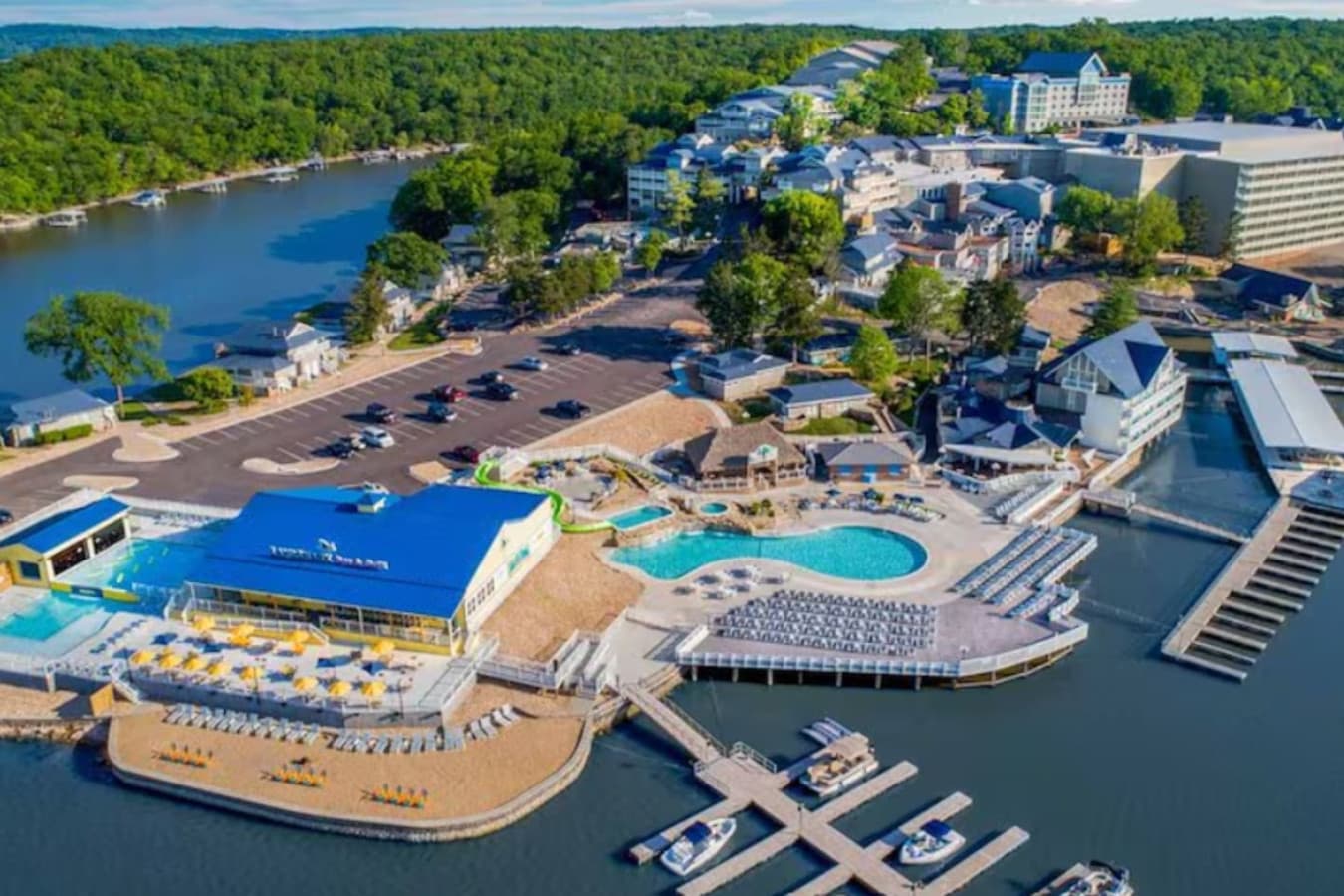 This stunning lakefront resort community offers unparalleled amenities, including multiple pools, a swim-up bar, a marina with boat slips, and direct access to the Lake of the Ozarks. With beautifully designed accommodations, vibrant dining options,