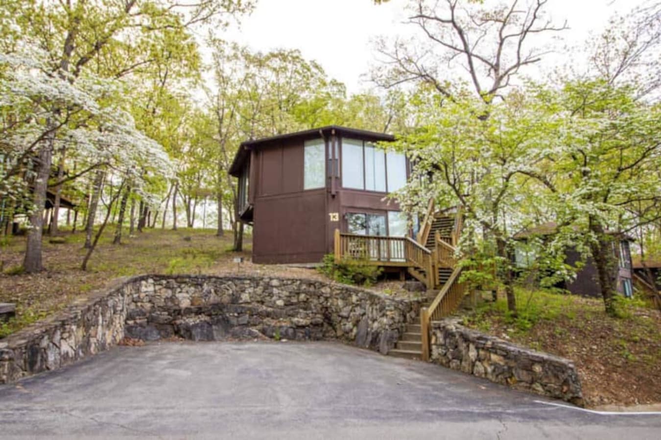 Discover the distinctive architecture of a Treetop Village villa, offering an elevated perspective and a peaceful escape within the Four Seasons Area.