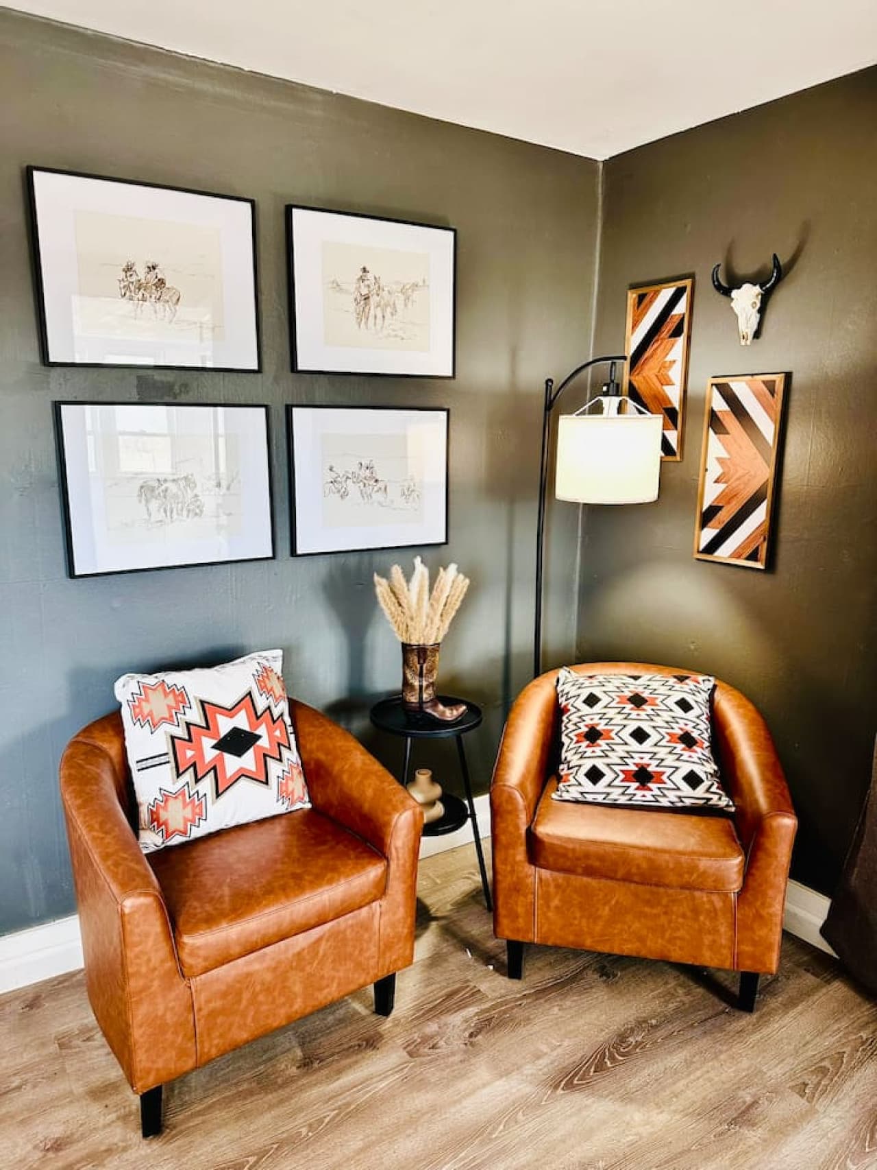 Cozy corner with leather armchairs—ideal for morning coffee or a quiet read.