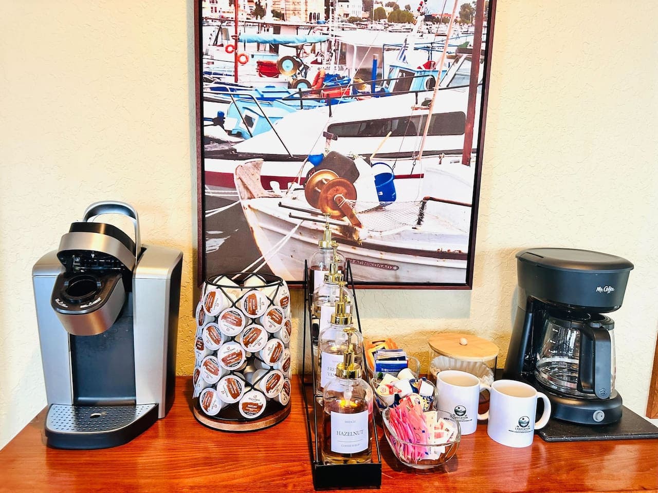 Enjoy your favorite drinks with a dedicated coffee bar featuring a Keurig, drip coffee maker, and all the essentials.