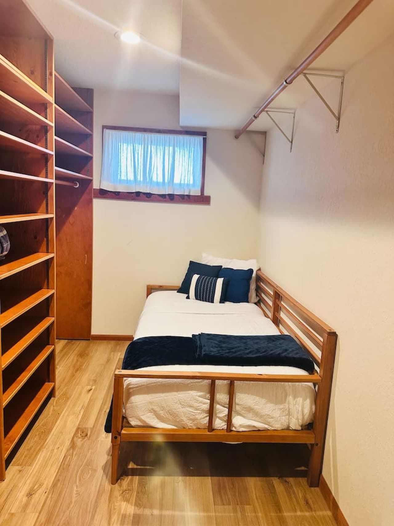 Conveniently located off the master suite, this cozy twin bed provides additional sleeping space for a guest or child.