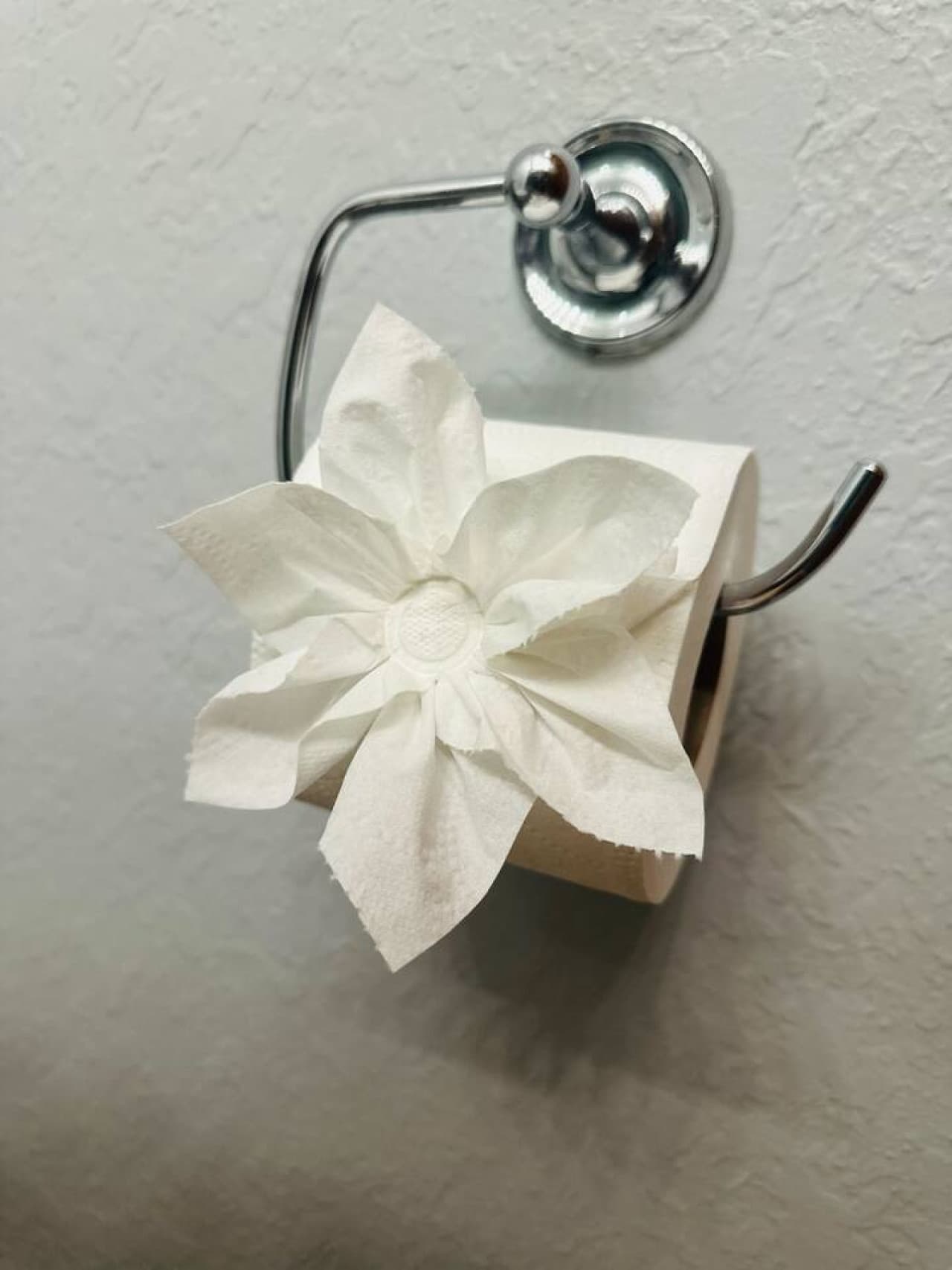Every detail counts, including a beautifully folded flower towel to welcome you.