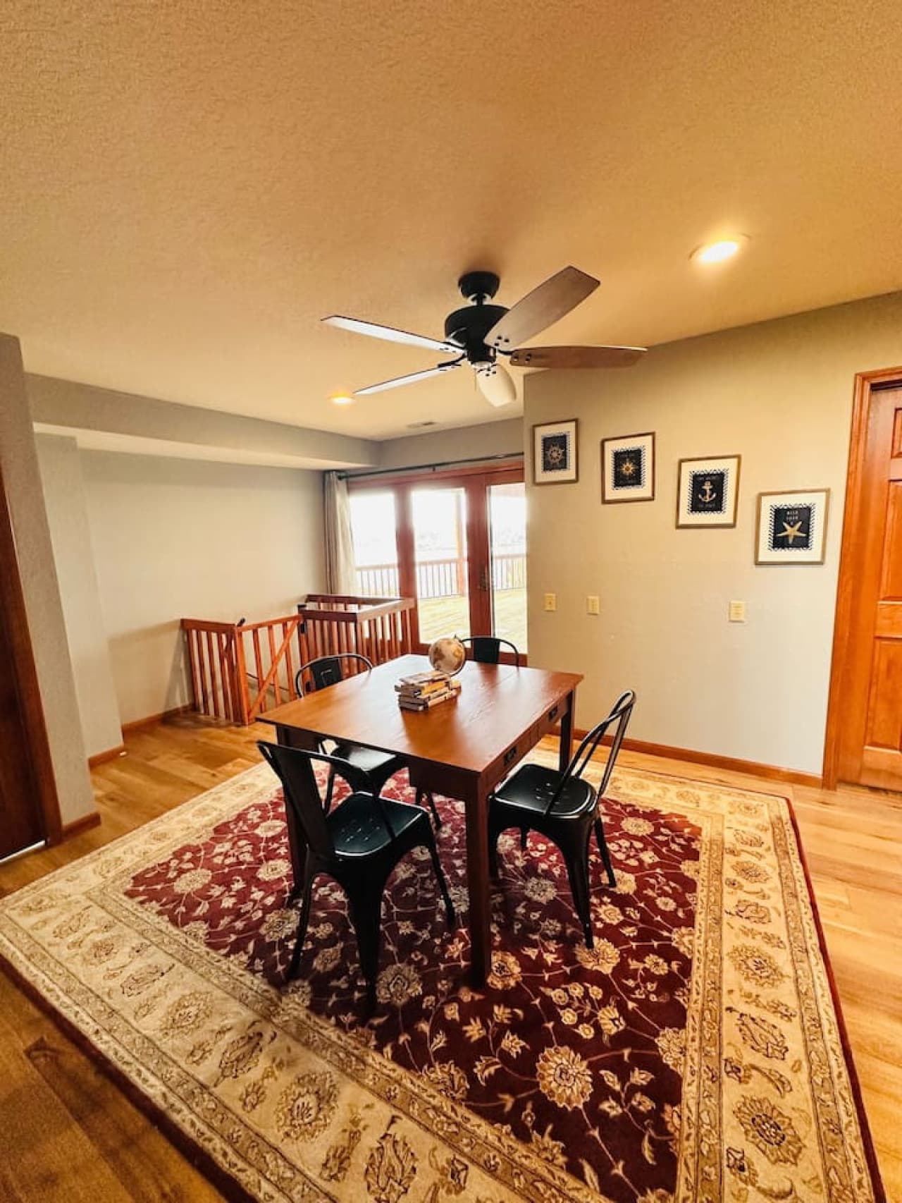 Enjoy quality time in the family room, complete with a cozy rug, seating for games, and plenty of natural light.