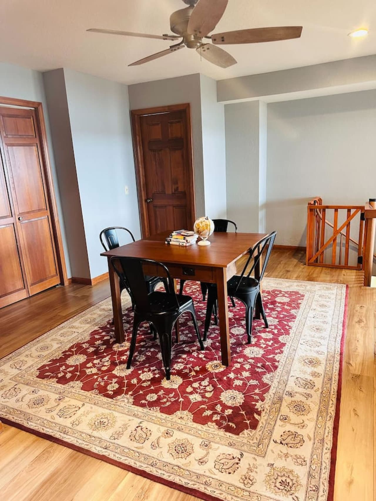 The middle-level family room is perfect for unwinding or playing board games, offering access to stunning views.