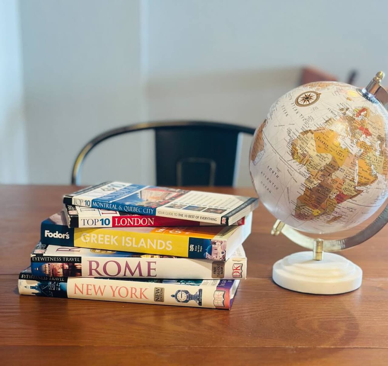 Explore travel-themed books and enjoy family games in this thoughtfully furnished middle-level area.