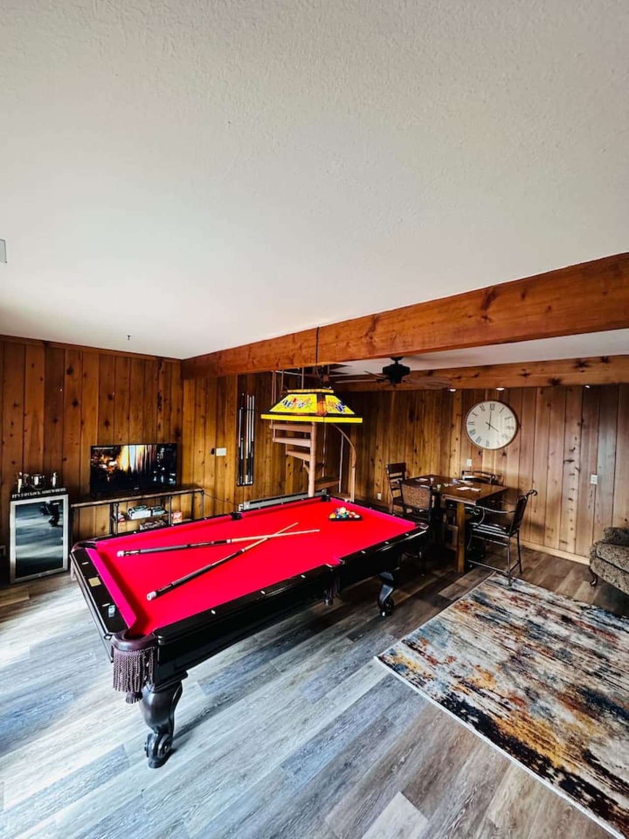 Comfortable seating in the lower-level game room for lounging.