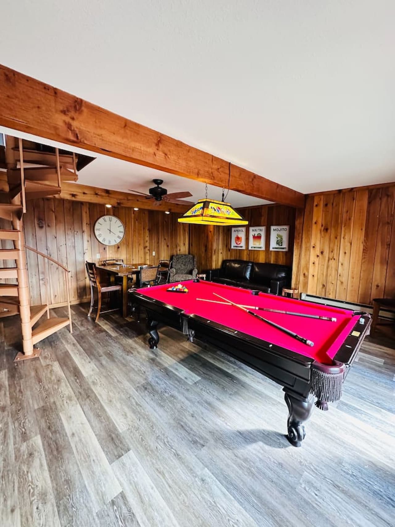 Enjoy a game of pool in the cozy lower-level game room.