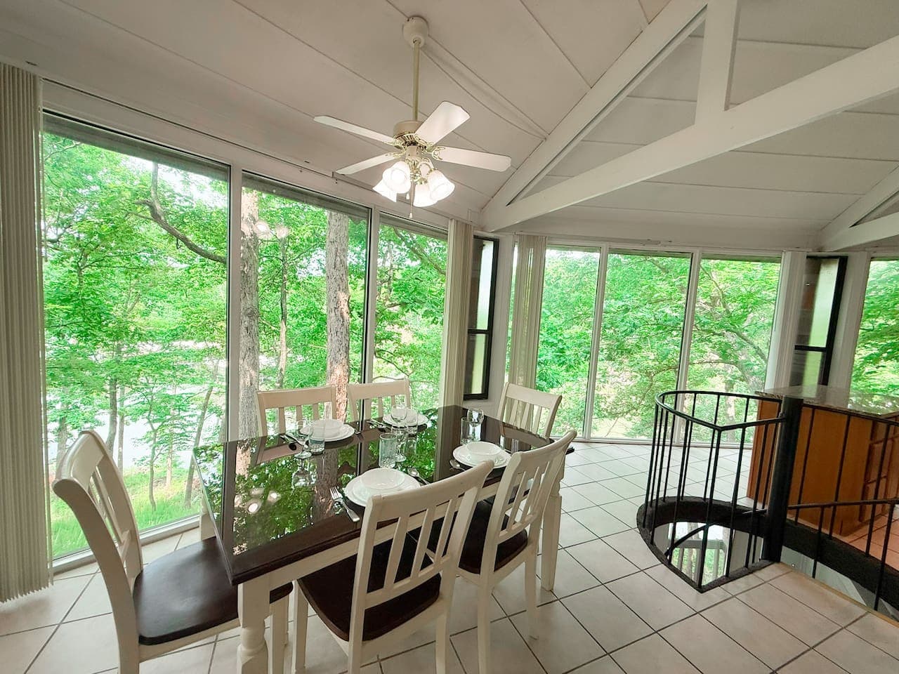 Floor-to-ceiling windows bring the outdoors in—your dining area with a front-row seat to nature.