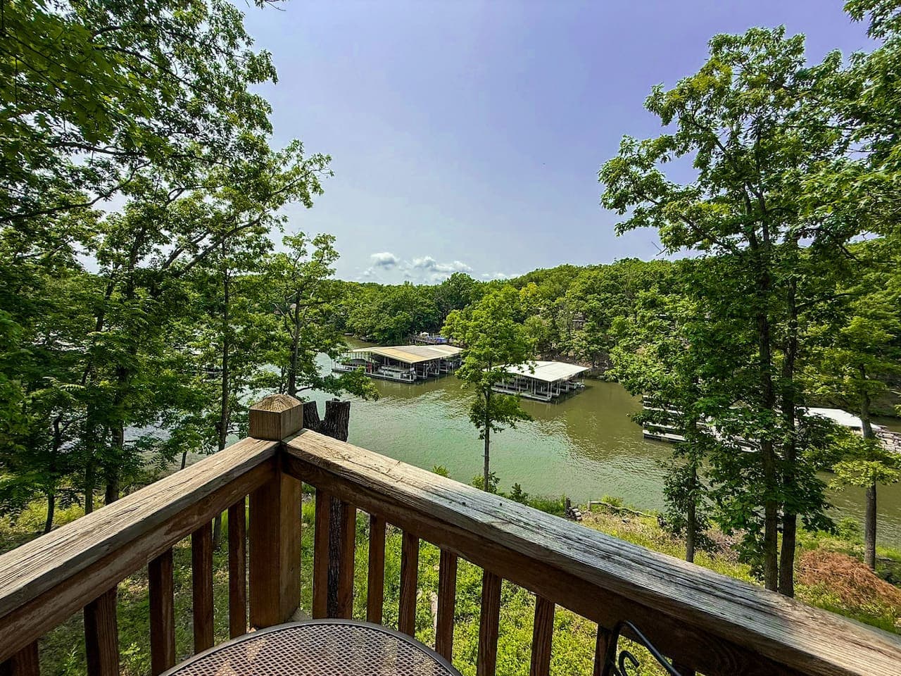 Take in the treetop breeze and sparkling lake views—this peaceful deck is made for morning coffee or sunset lounging.