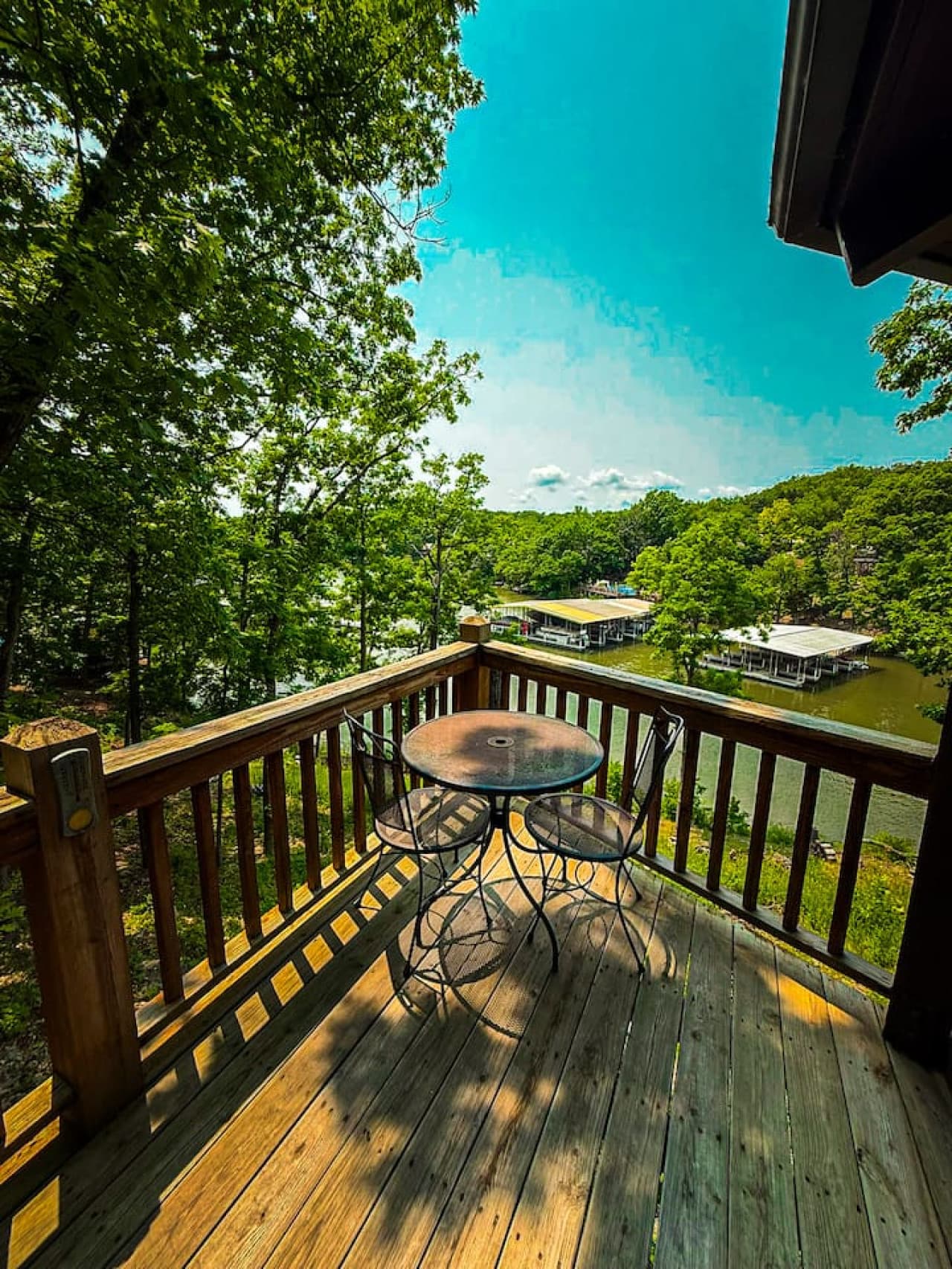 Sip, relax, and recharge—your private deck overlooks the lake .