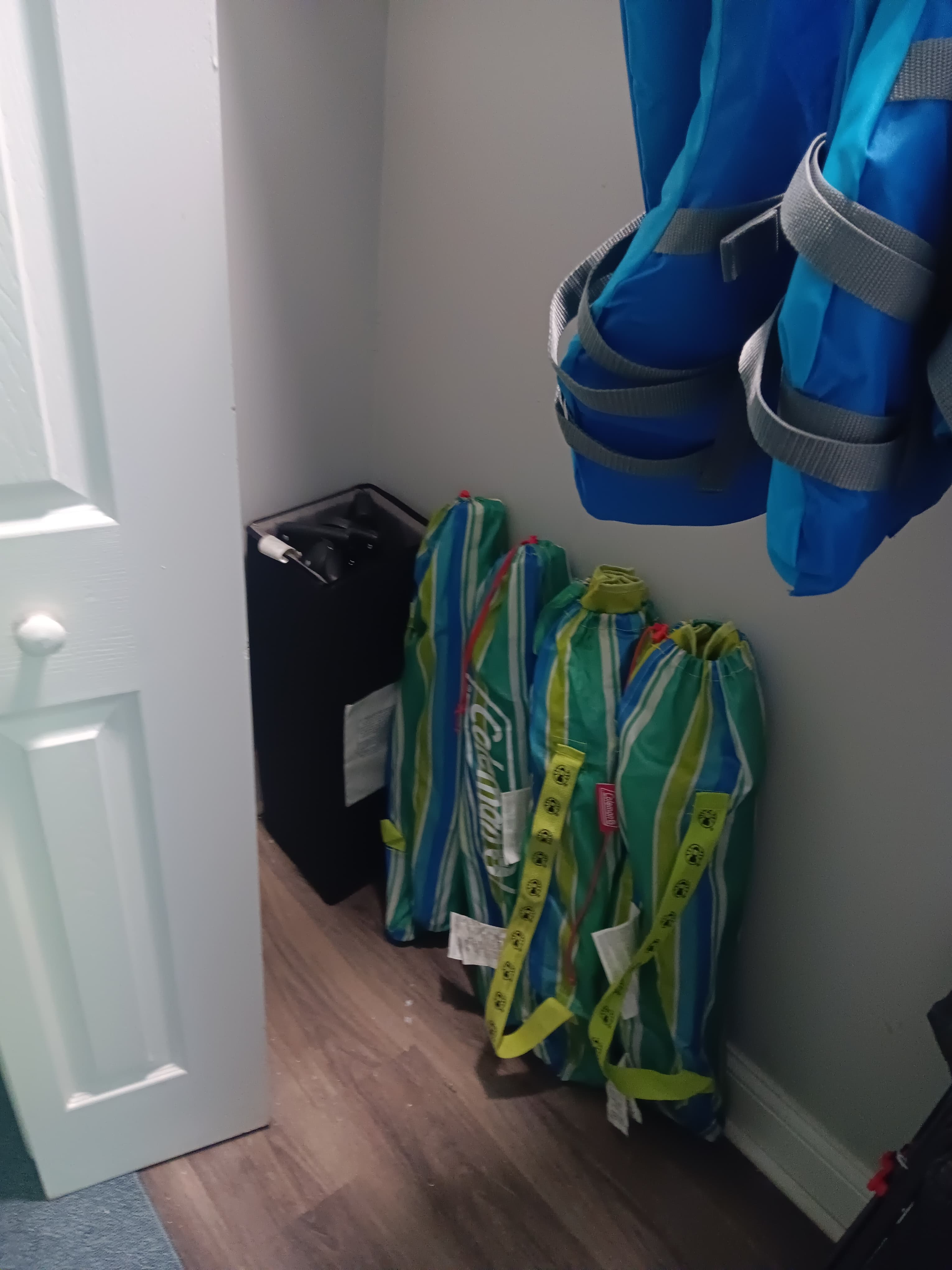 Entrance Level Closet where the baby crib, beach chairss & Umbrella, Wagon and PFDs are stored