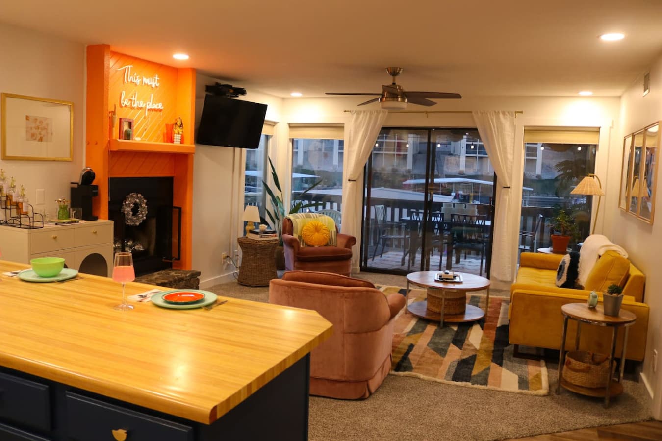 A view of the spacious living and dining area, where comfort meets style for your lakeside getaway.